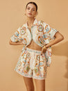 Ensemble Short Femme avec Polo Imprimé et Manches Courtes pose
